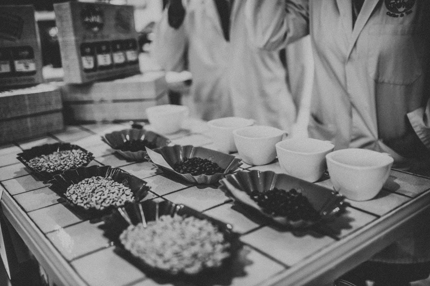 Cupping and tasting coffee for a customer  